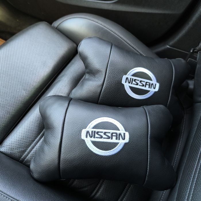 Подушки в авто 2 шт Nissan, натуральная кожа, с логотипом Ниссан, на подголовник для вашей машины