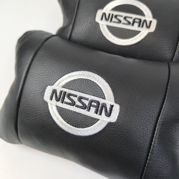Подушки в авто 2 шт Nissan, натуральная кожа, с логотипом Ниссан, на подголовник для вашей машины