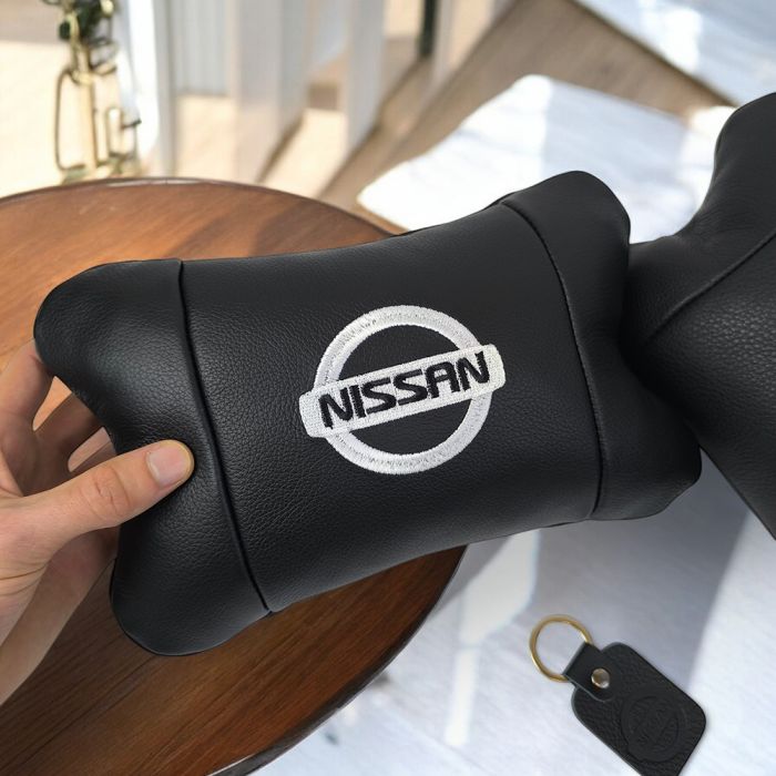 Подушки в авто 2 шт Nissan, натуральная кожа, с логотипом Ниссан, на подголовник для вашей машины