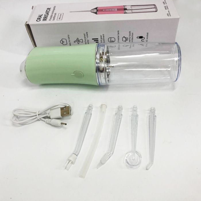 Ирригатор для чистки зубов и полости рта Oral Irrigator с аккумулятором и сменными насадками. Цвет: зеленый
