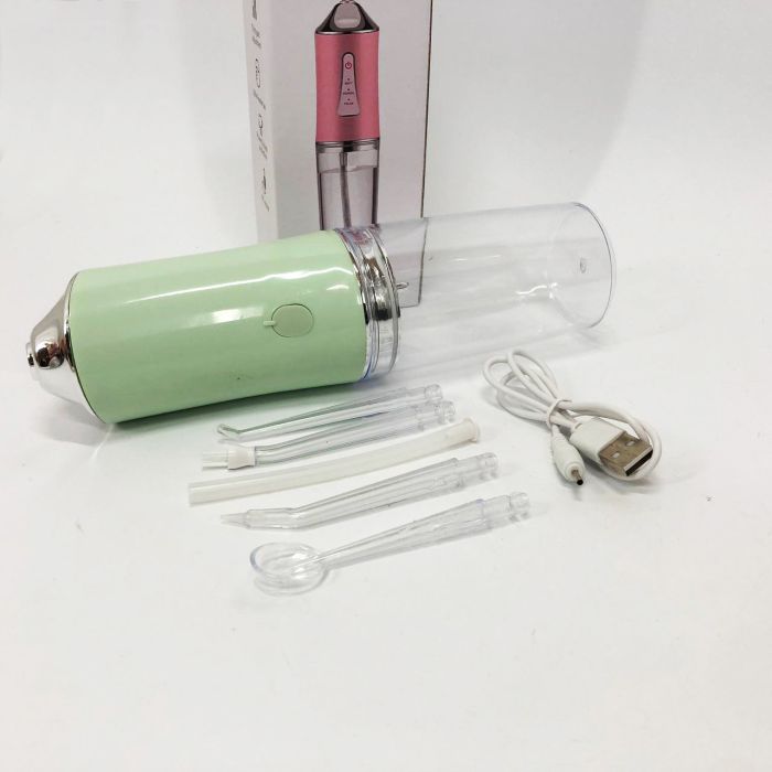 Ирригатор для чистки зубов и полости рта Oral Irrigator с аккумулятором и сменными насадками. Цвет: зеленый