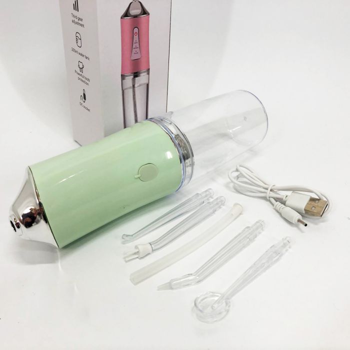 Ирригатор для чистки зубов и полости рта Oral Irrigator с аккумулятором и сменными насадками. Цвет: зеленый