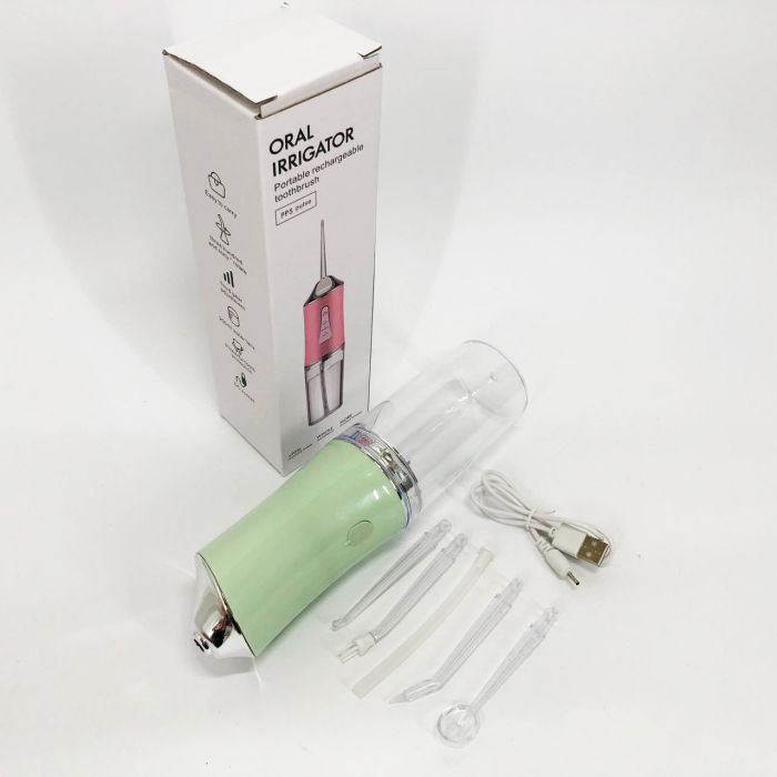 Ирригатор для чистки зубов и полости рта Oral Irrigator с аккумулятором и сменными насадками. Цвет: зеленый