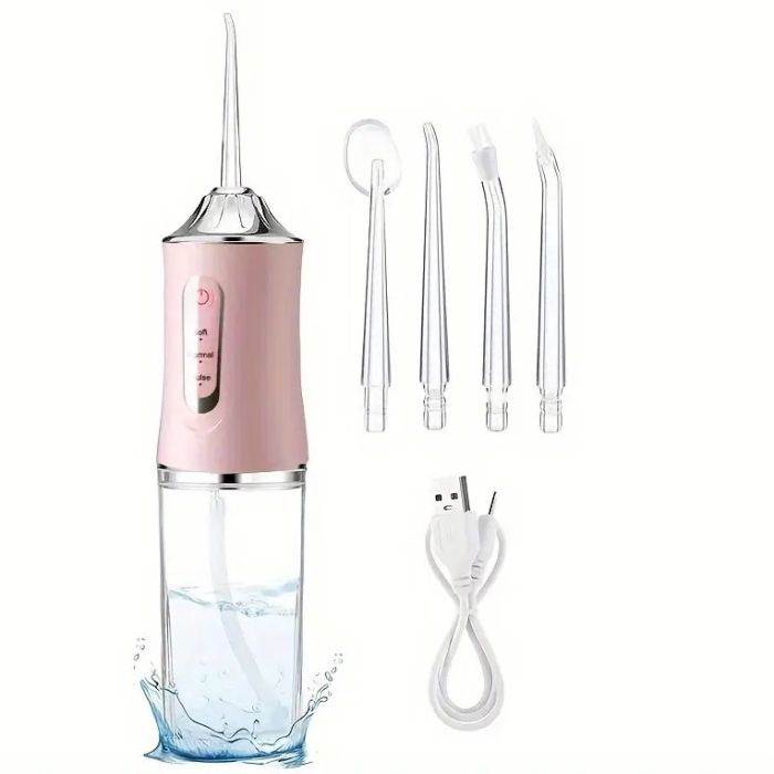 Ирригатор для чистки зубов и полости рта Oral Irrigator с аккумулятором и сменными насадками. Цвет: розовый