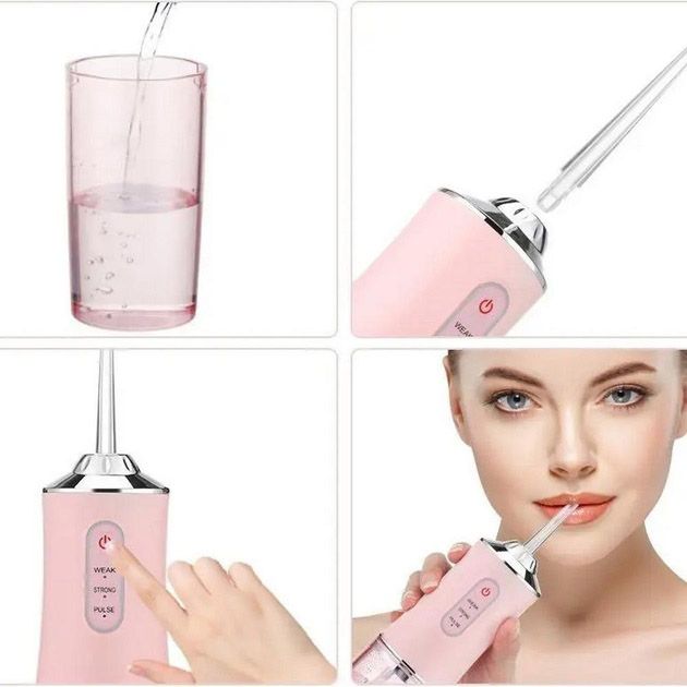 Ирригатор для чистки зубов и полости рта Oral Irrigator с аккумулятором и сменными насадками. Цвет: розовый